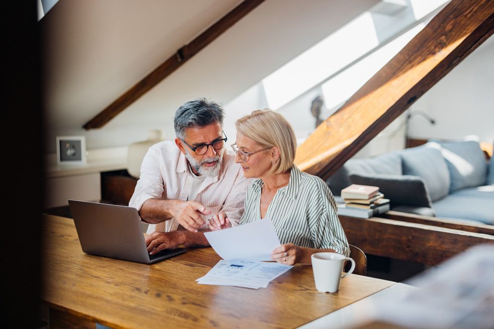 Couple looking at laptop