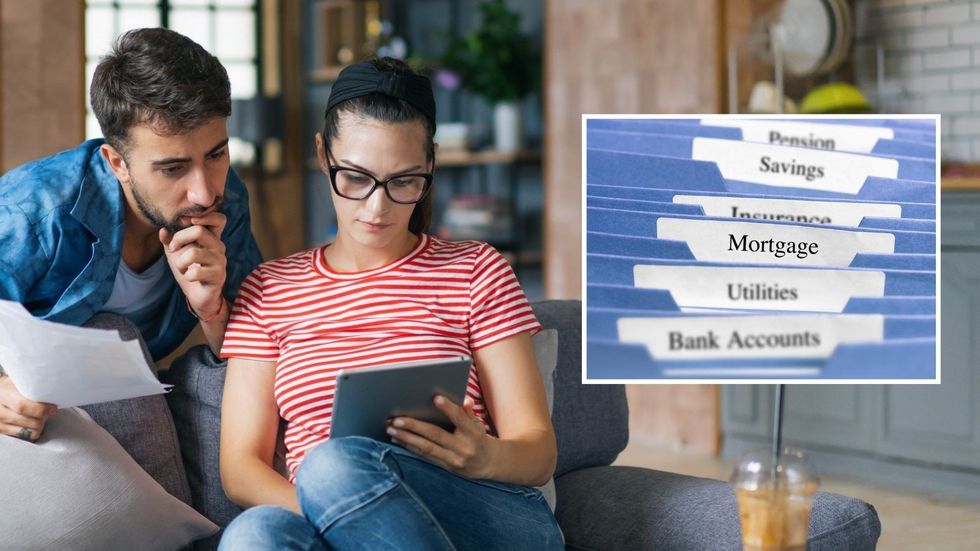 Couple looking over mortgage files on iPad