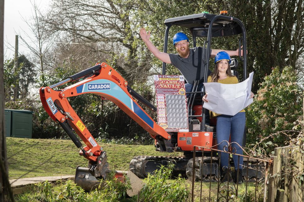 Craig and Zoe Haggie on a digger