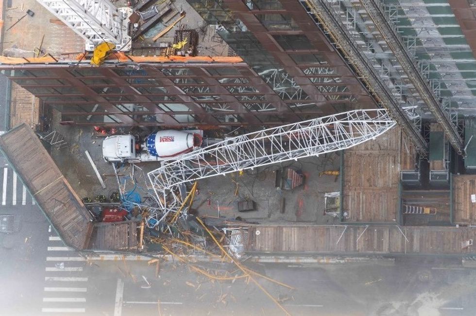 Crane smashing into a building