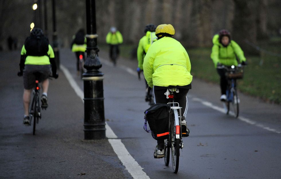 Cyclists with high-visibility jackets on