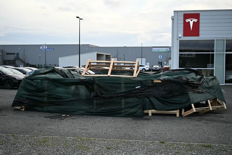 Damage outside the Tesla dealership in Toulouse, France