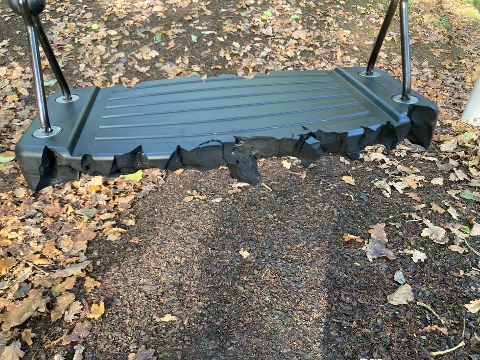 Damaged swing set