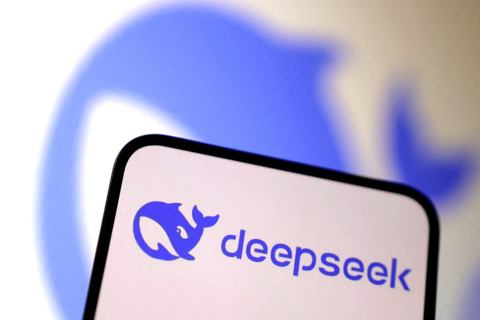 DeepSeek whale logo on a smartphone with a blurred image in the background