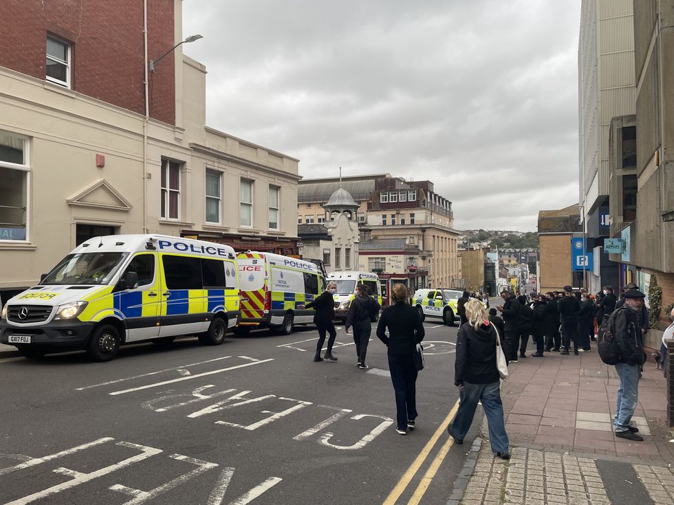 Demonstrators and police gather in Brighton