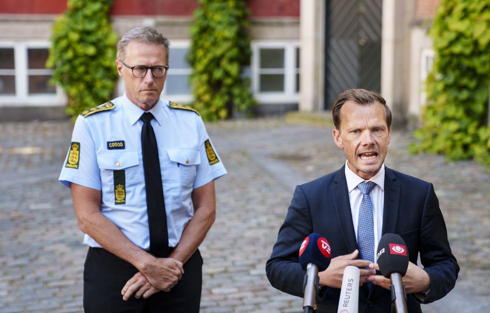 Denmark's Minister of Justice Peter Hummelgaard (R) and National Police Chief Thorkild Fogde