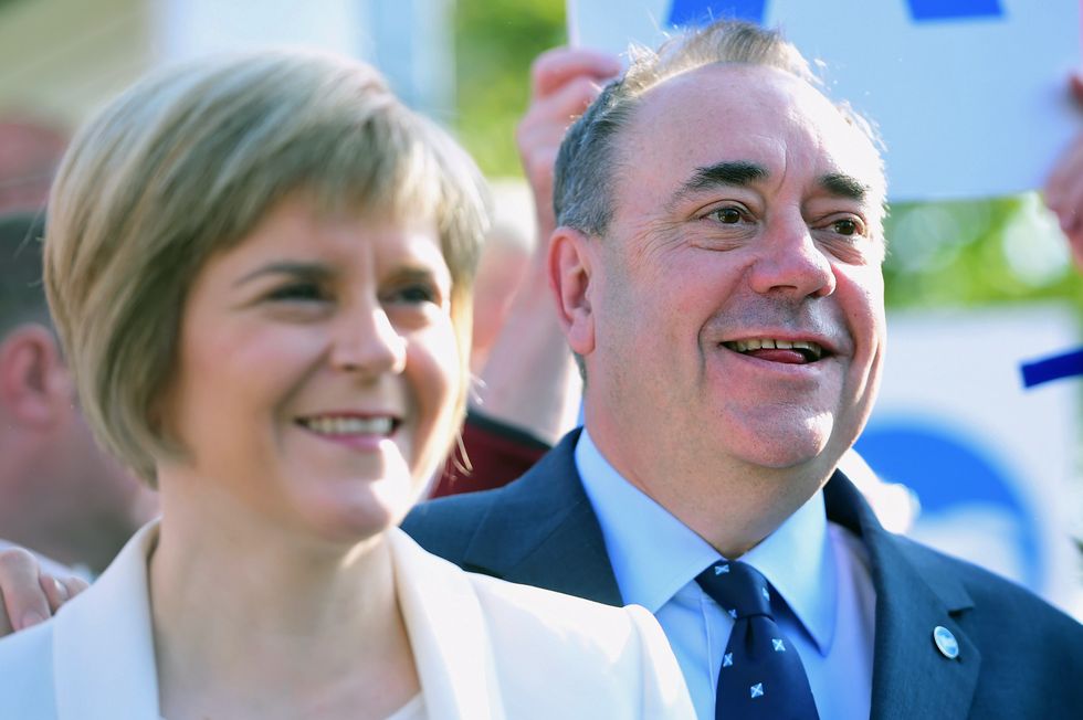 Deputy First Minister Nicola Sturgeon and First Minister Alex Salmond campaign in Piershill Square on September 10, 2014