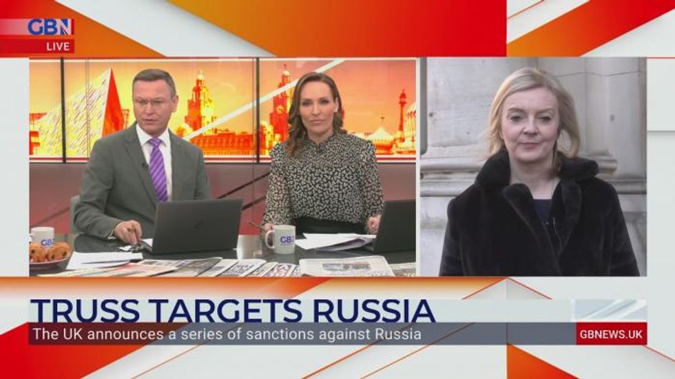 Liz Truss vows to 'inflict pain on Vladimir Putin' as British troops stationed in Eastern Europe