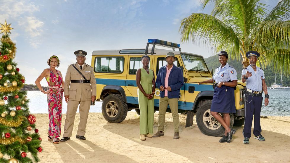 Don Gilet and Death in Paradise cast