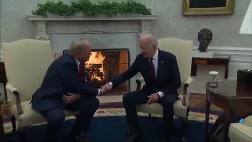 Donald Trump and Joe Biden shake hands