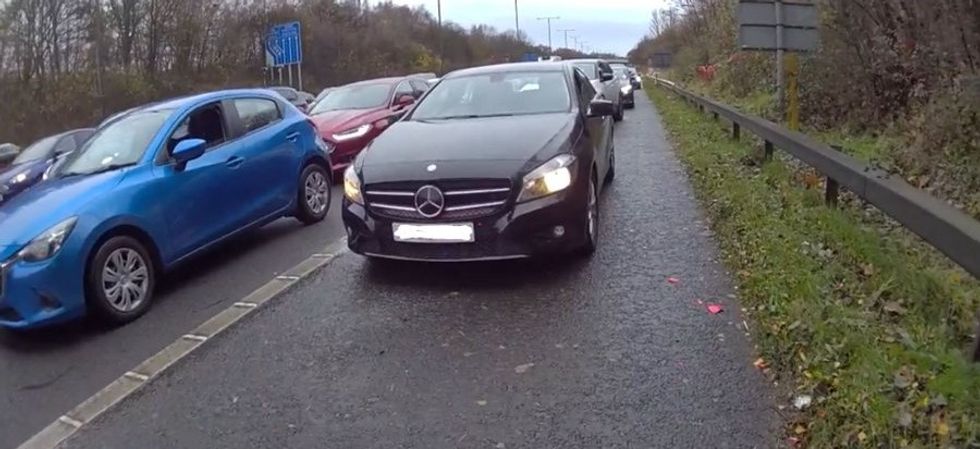 driver on hard shoulder