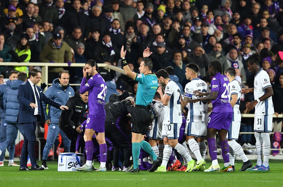 Edoardo Bove was surrounded by his team-mates after the incident