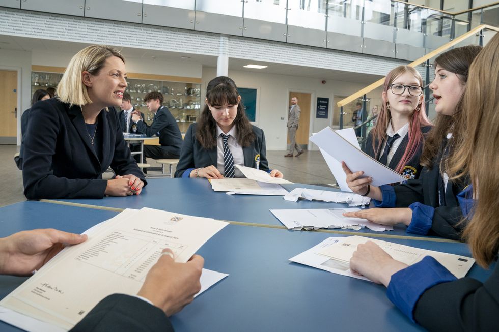 Education Secretary Jenny Gilruth meets with students at Madras College in St Andrews, Fife, as they receive their SQA results.