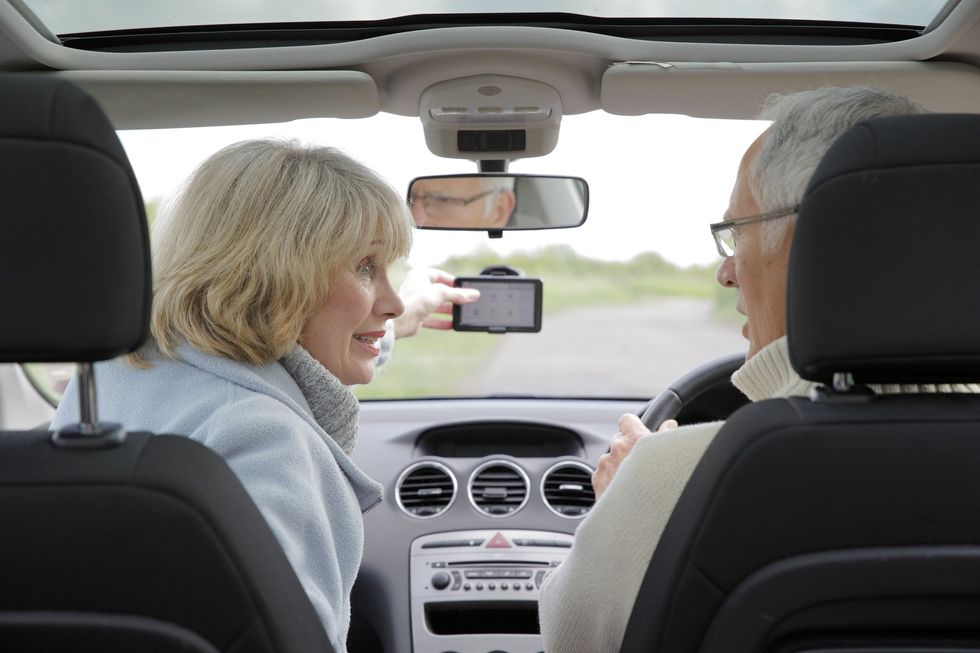 Elderly drivers in car