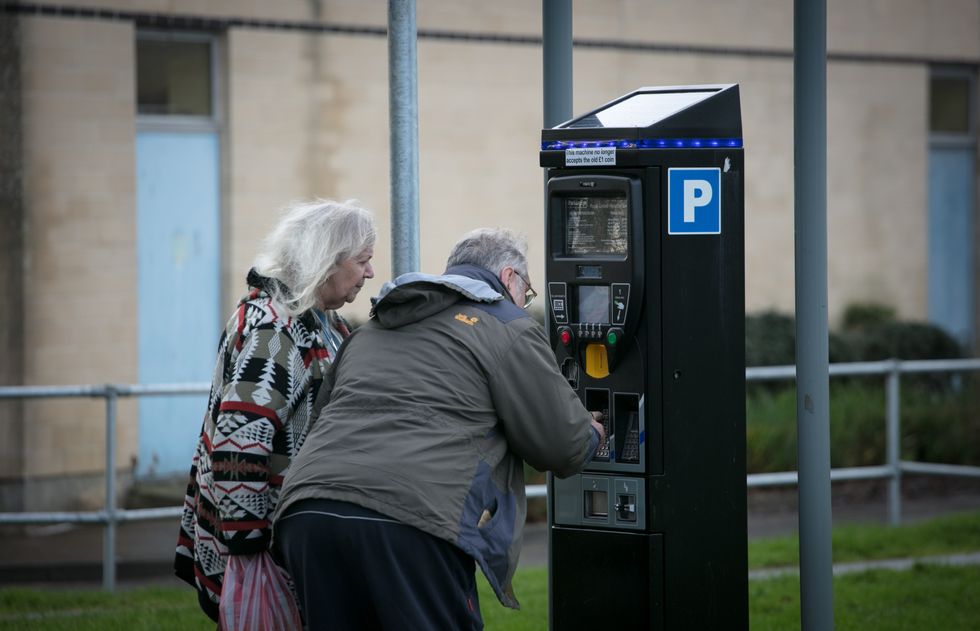 elderly-people-paying-for-parking.jpg