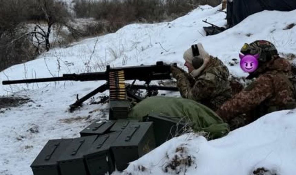 Elina Svitolina also posed operating a heavy machine gun