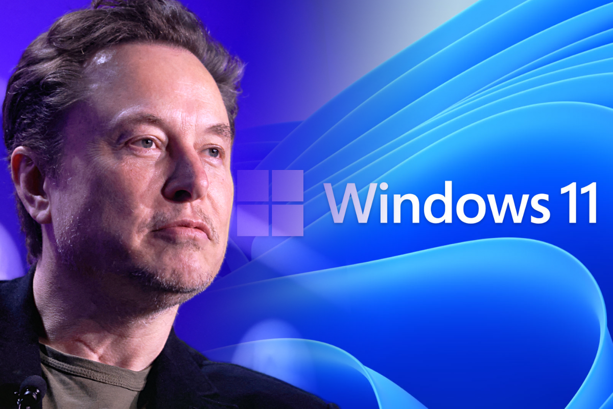 elon musk pictured with the windows 11 logo and default wallpaper behind him  