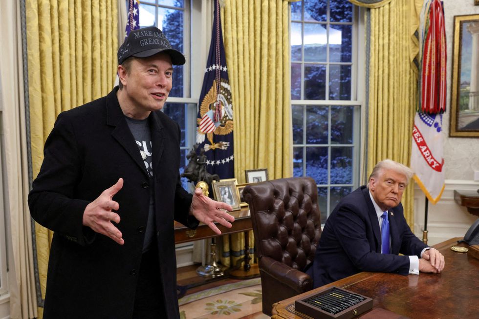 Elon Musk with President Donald Trump in the White House Oval Office