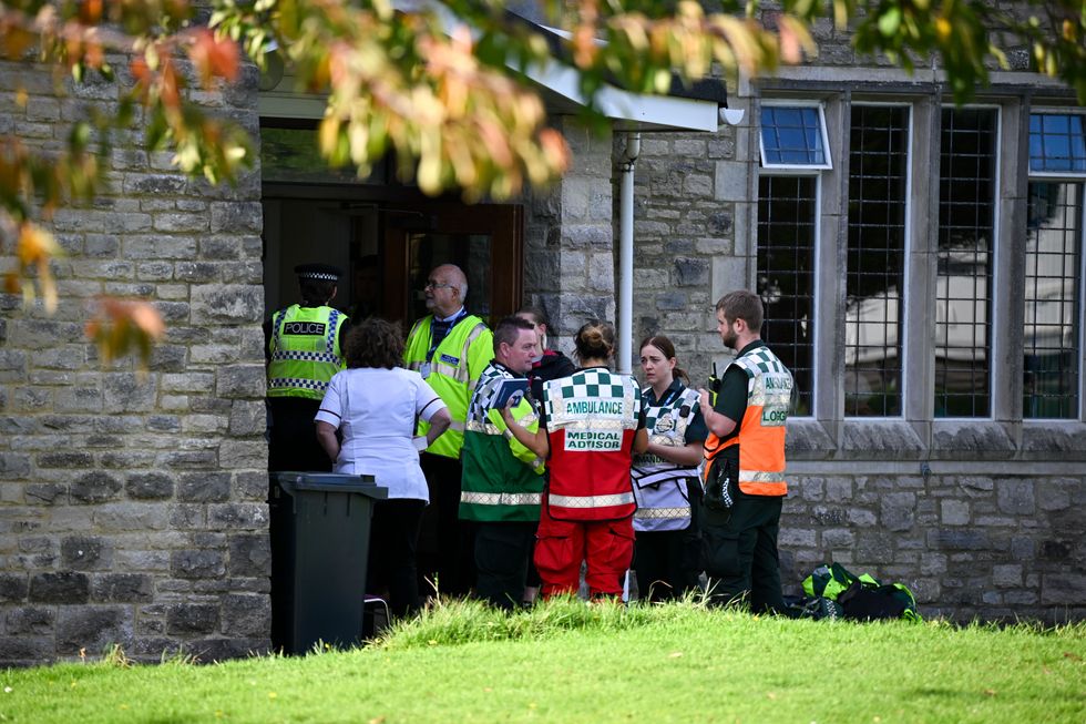 Emergency services are seen at All Saints church hall where the residents were evacuated to after the incident at Gainsborough Care Home