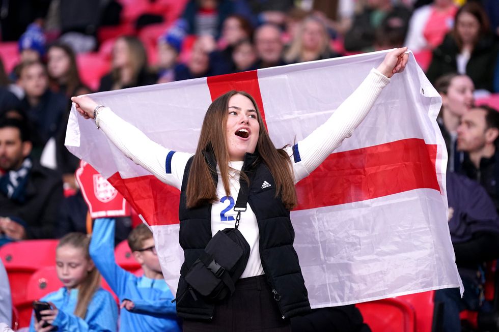 England fans hold up signs and flags