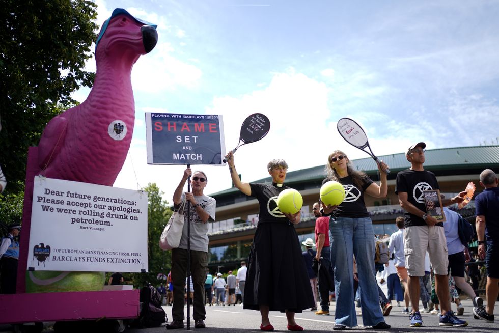 Extinction Rebellion protesters outside of Wimbledon on day eight of the 2023 Wimbledon Championships