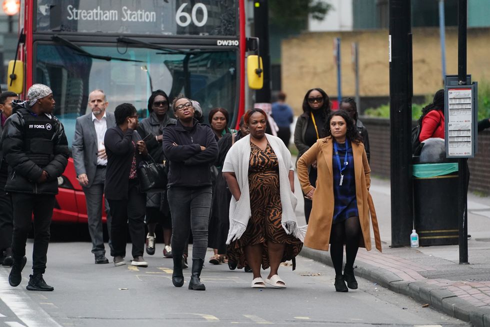 Family and friends of Elianne Andam at the scene in Croydon