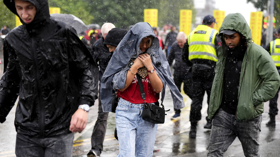 Fans in the rain