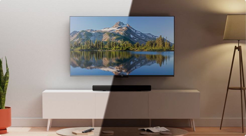 fire tv omni in a light and dark room with the screen adjusting between the two