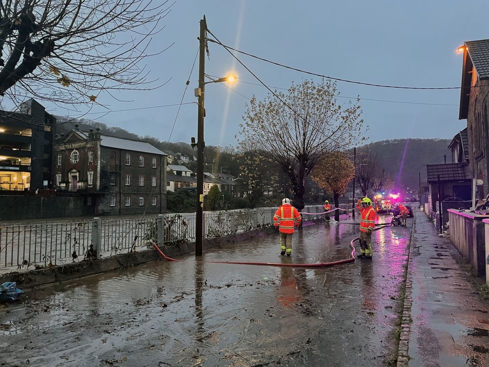 Firefighters pumping flood waters on Sion Street, Pontypridd, Wales\u200b