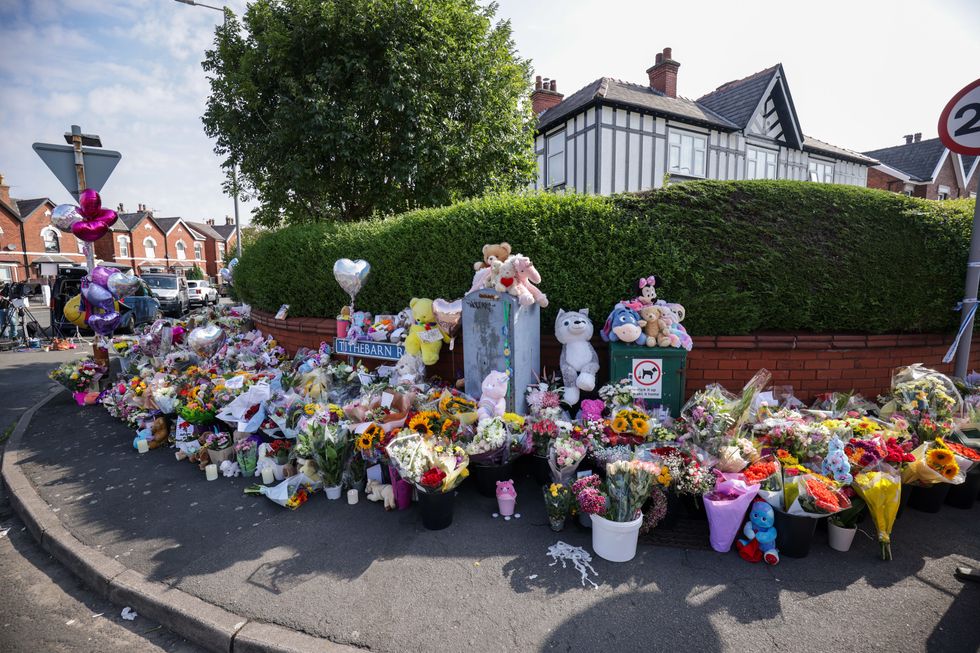 Floral tributes were left near the scene