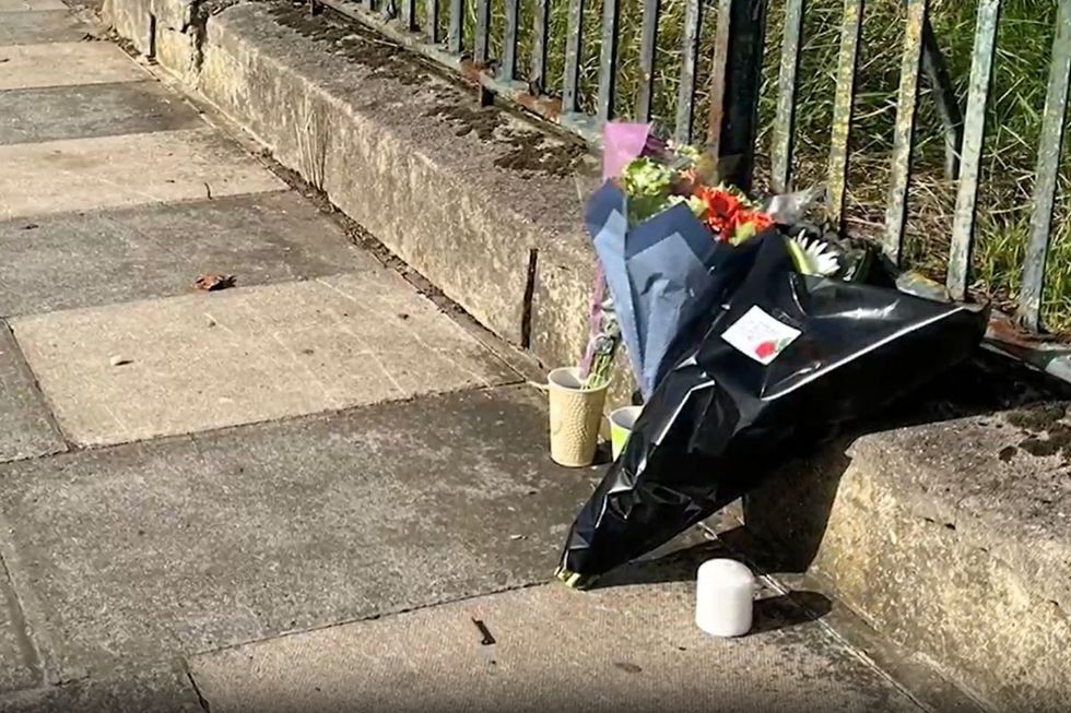 Flowers have been left after the crash