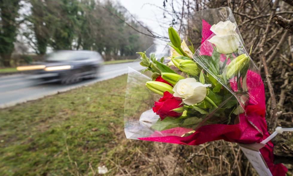 Flowers left at the scene following the double crash