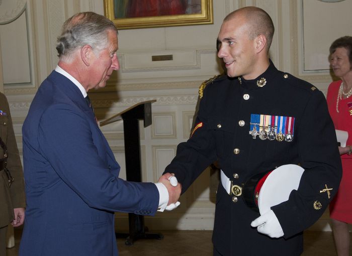 Former Lance Corporal Matt Croucher and then-Prince of Wales, King Charles III