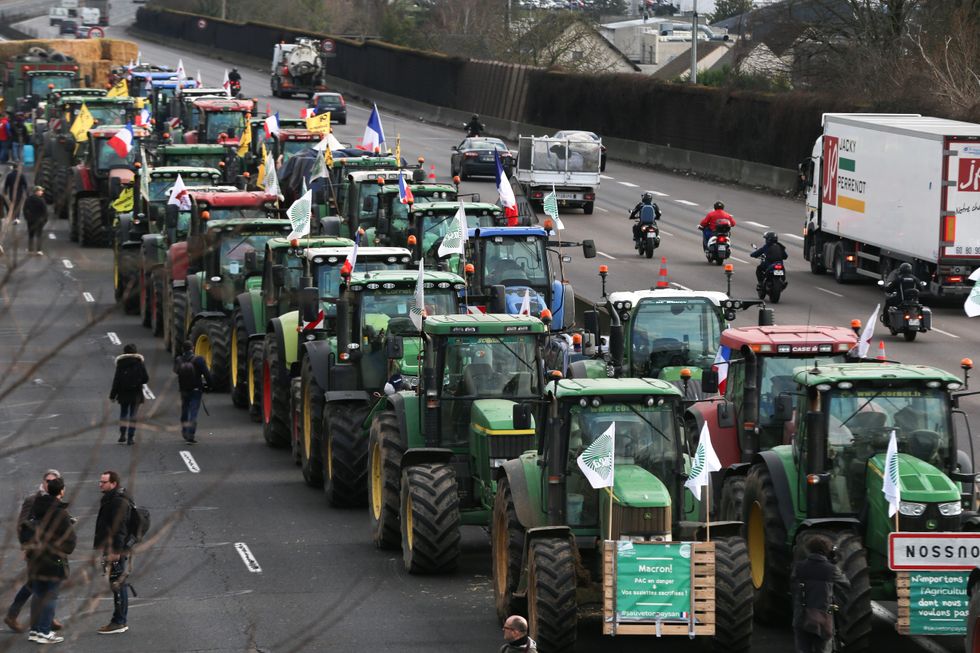 French riot police arrest dozens of farmers after they stormed 'belly ...