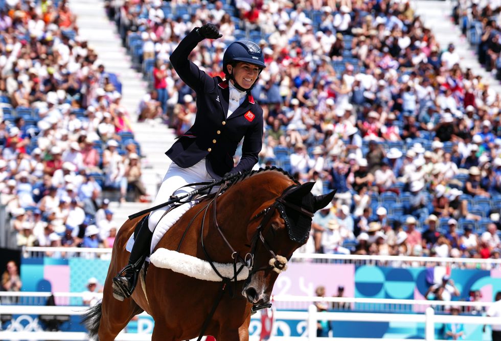 Great Britain's Laura Collett aboard London 52 celebrates following the Eventing Team Jumping Final