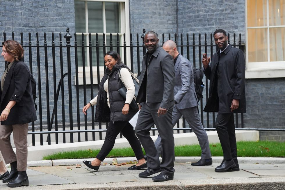 Idris Elba (centre) arrives to attend a knife crime summit hosted by Prime Minister Sir Keir Starmer