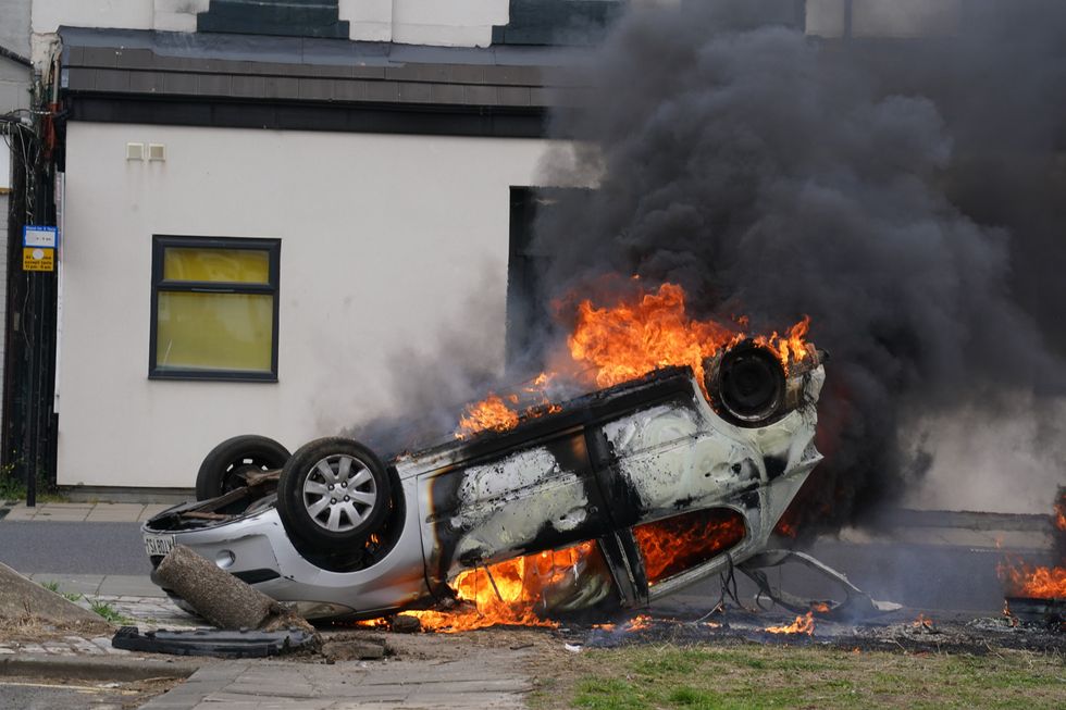 Image of care worker's car on fire 