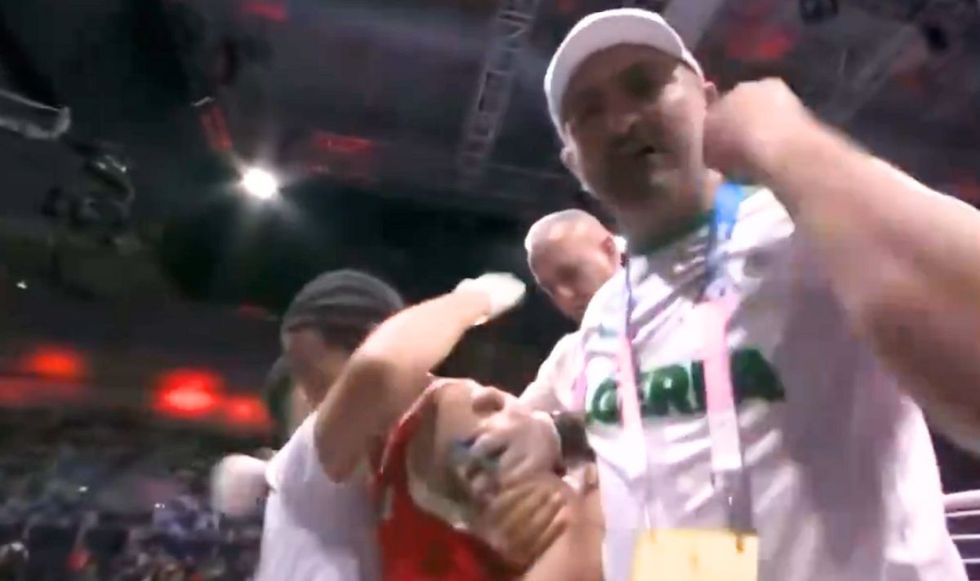 Imane Khelif's coach celebrated to the camera