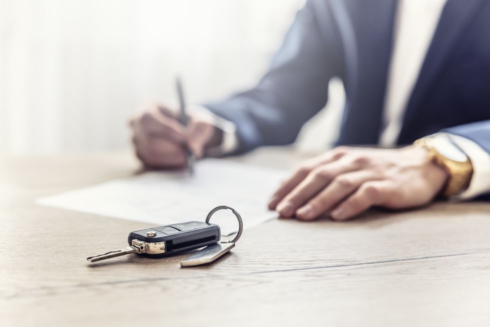 Insurance policy and car keys