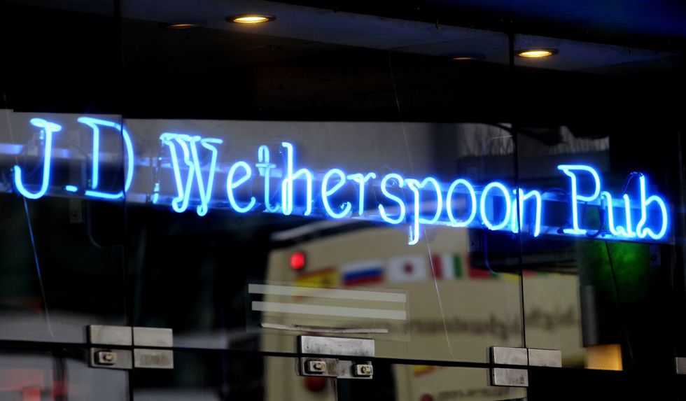 JD Wetherspoon sign above pub