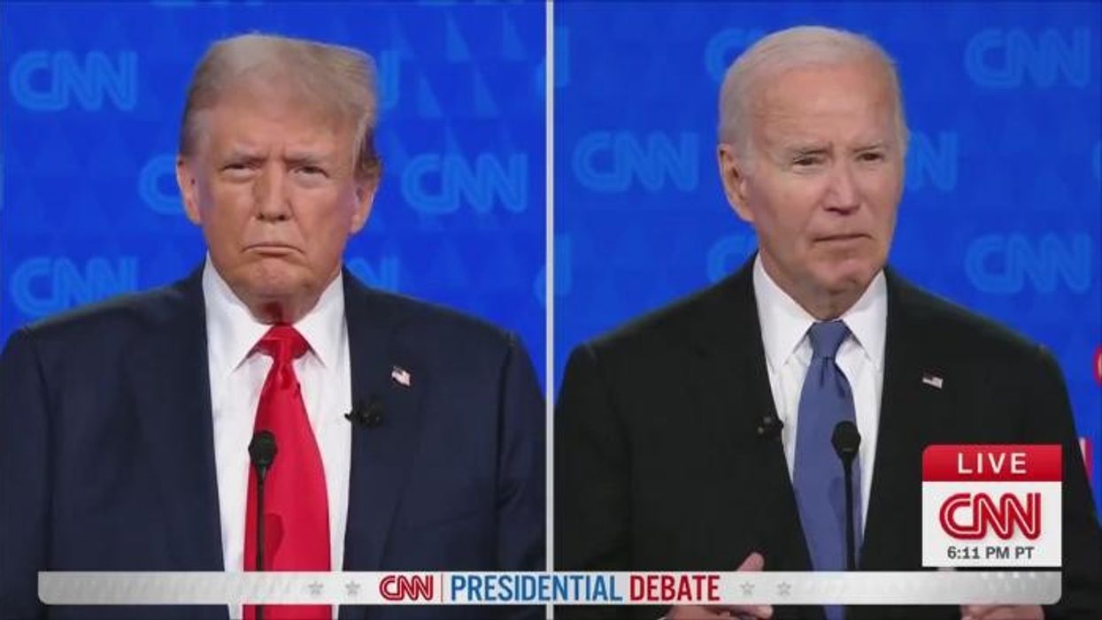 Joe Biden FREEZES mid-sentence before CNN host steps in just five minutes into debate