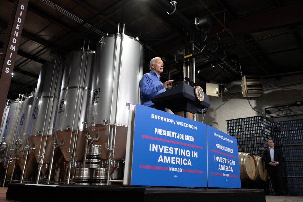 Joe Biden delivers remarks on his administration\u2019s infrastructure strategy inside the Earth Rider Brewery in Superior