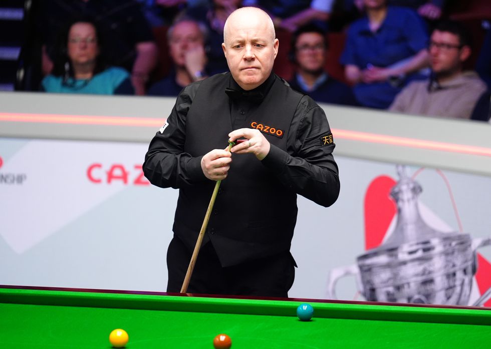 John Higgins was facing He Guoqjang