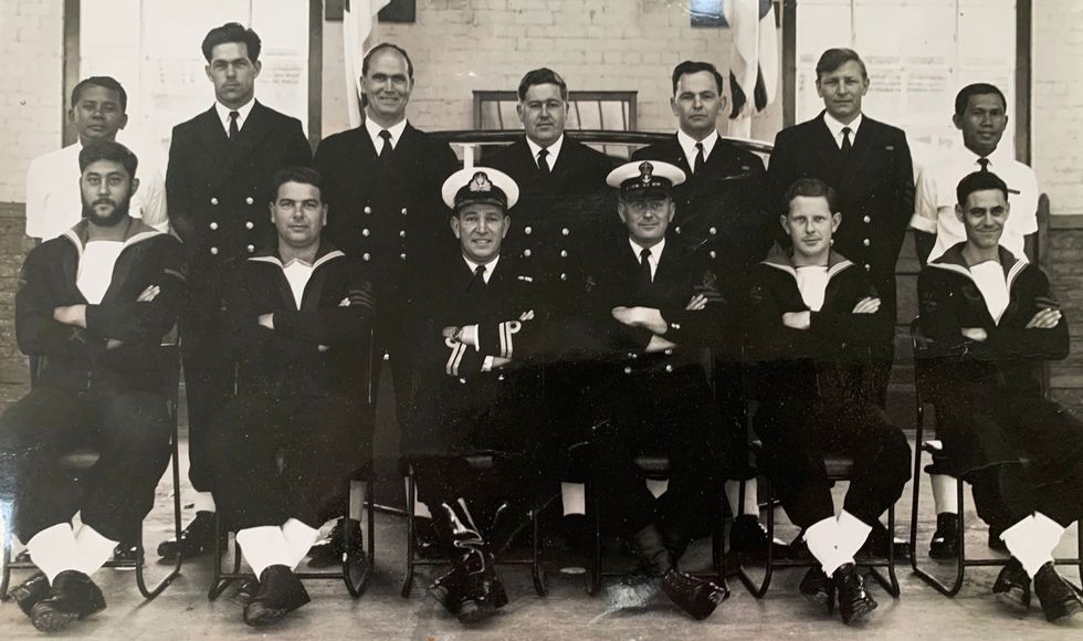 John Maitland-Hudson with his crew, sat on the left