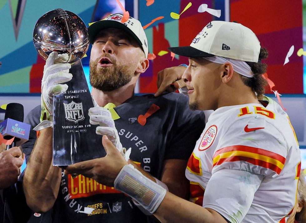 Kansas City Chiefs Travis Kelce and Patrick Mahomes with the Vince Lombardi Trophy celebrating their victory