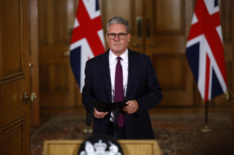 Keir Starmer speaking at a podium