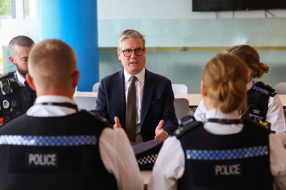 Keir Starmer talking to police