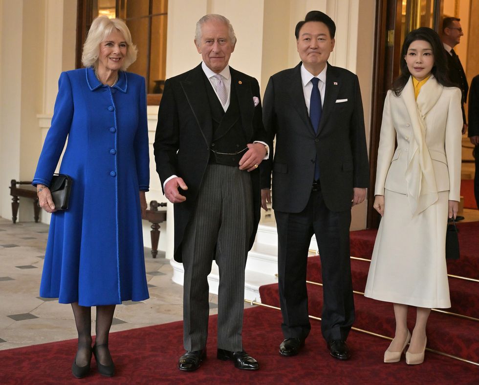 King Charles III and Queen Camilla pose with South Korea's President Yoon Suk Yeol and South Korea's First lady Kim Keon Hee