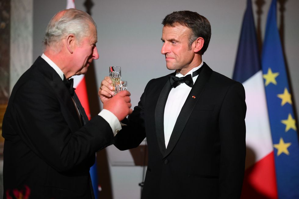 King Charles III (left) and French President Emmanuel Macron attending the State Banquet at the Palace of Versailles, Paris