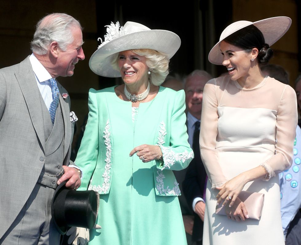 King Charles, Queen Camilla and Meghan Markle